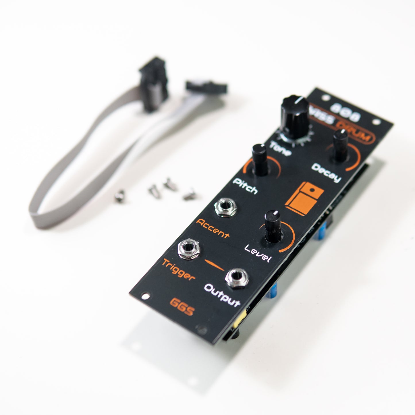 A perspective photo showing screen-printed PCB front panel of the 808 Bass Drum Eurorack module. The text and lines are slightly raised, showing the texture of the hand-made silk-screen.