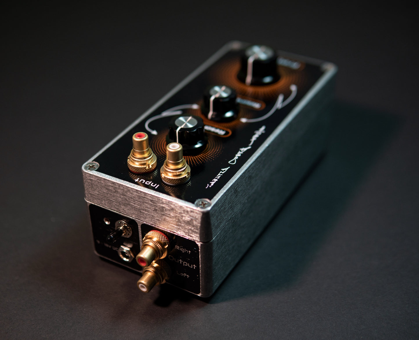 Connection for the high-pass filter, it can be integrated into a DJ or live performance sound setup.