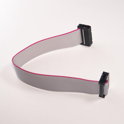 A 16-pin to 16-pin ribbon cable with IDC connectors for connecting Eurorack modules to a power bus board.
