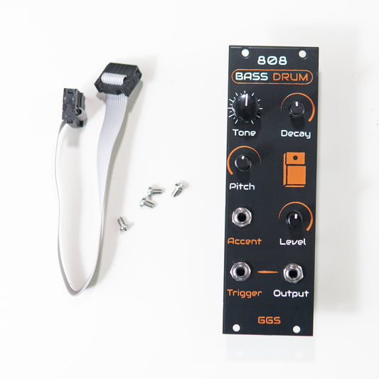 A black Eurorack module with a white and orange, hand-screen printed design. It has four black knobs labeled PITCH, TONE, DECAY, and LEVEL. Below the knobs are four 3.5mm jacks labeled TRIG, ACC, and OUT. The module is a handmade 808 Bass Drum clone.