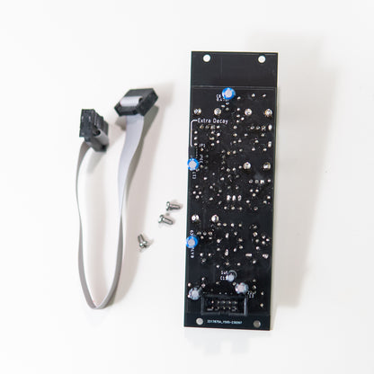 A side-angle view of the 808 Bass Drum Eurorack module, highlighting the small jumper switch located on the bottom of the PCB. The jumper is labeled to indicate its function of bypassing the decay resistor.