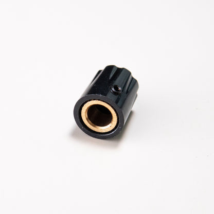 Close-up of a Davies 1900H Knob Clone, showcasing its brass insert and hexagonal screw