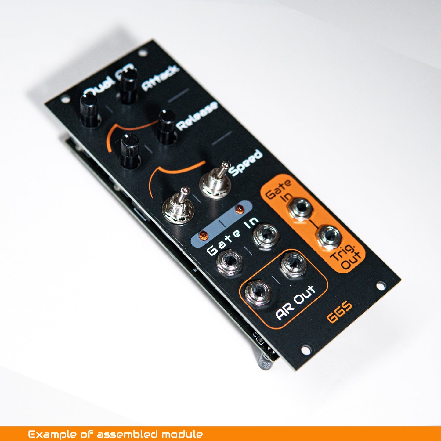 DIY Eurorack Attack/Decay envelope generator module build example, showing screen printed front panel with knobs and patch jacks, photographed at an angle on a white background.