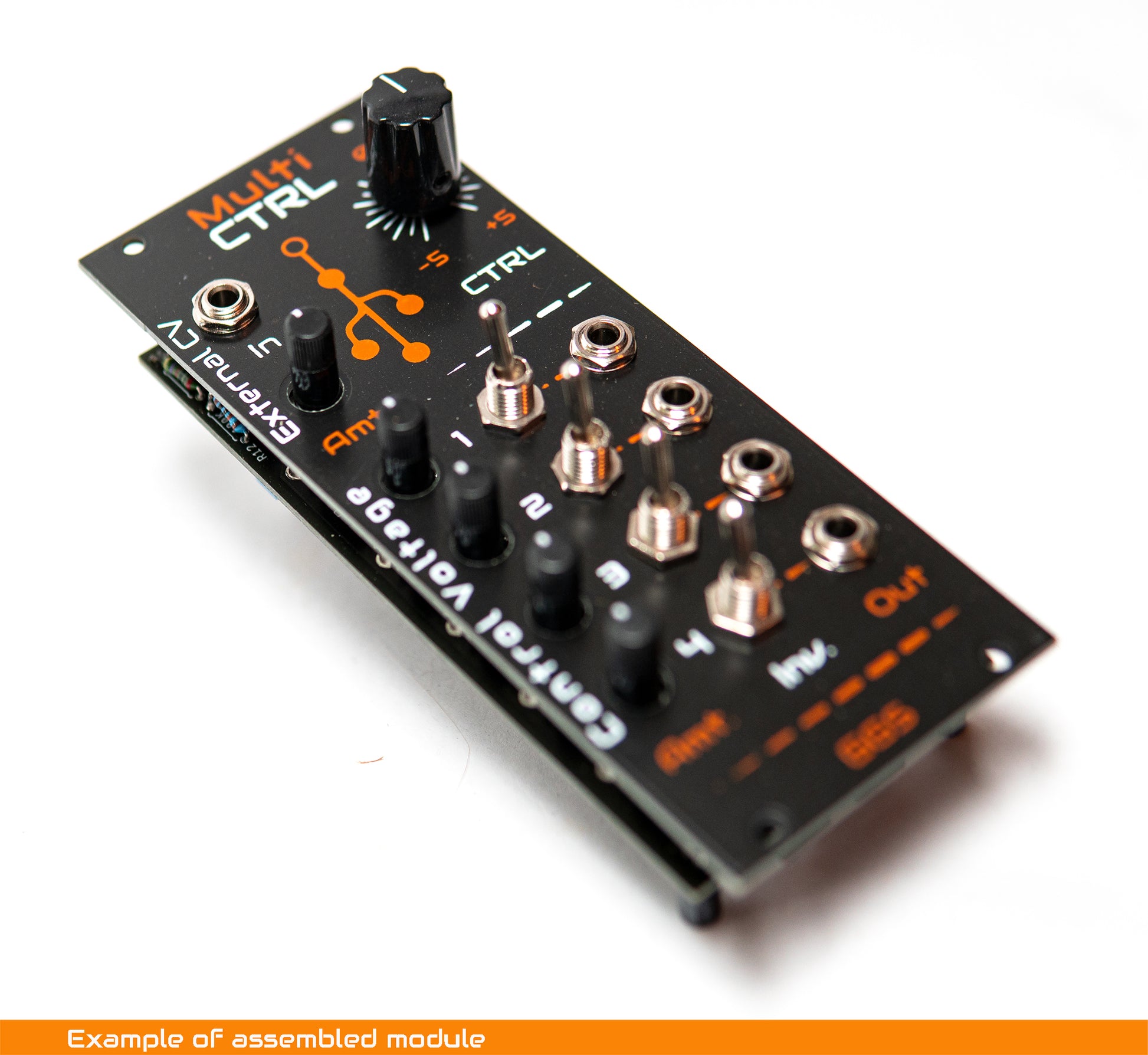 DIY Eurorack Multi CTRL module build example, showing screen printed front panel with knobs, switches and patch jacks, photographed at an angle on a white background.