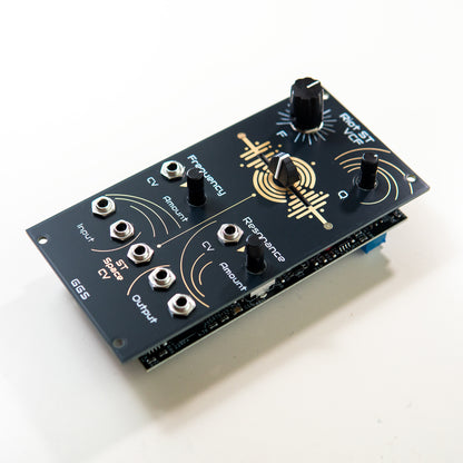 A detailed close-up of the Riot ST VCF's "Stereo Space" fader, showing the slider control for manipulating stereo cutoff frequencies. The unique black and copper PCB traces are visible around the control.