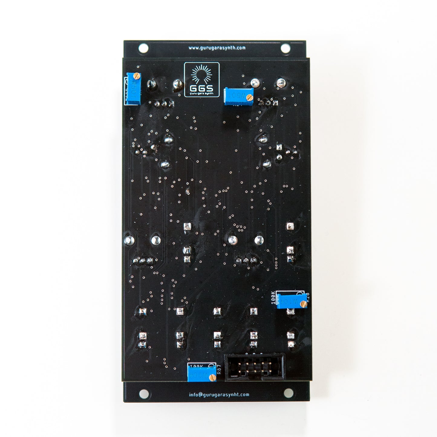 The rear view of the Riot ST VCF Eurorack module, revealing the power connector and several small trimmer potentiometers. The PCB board is visible, along with various electronic components.