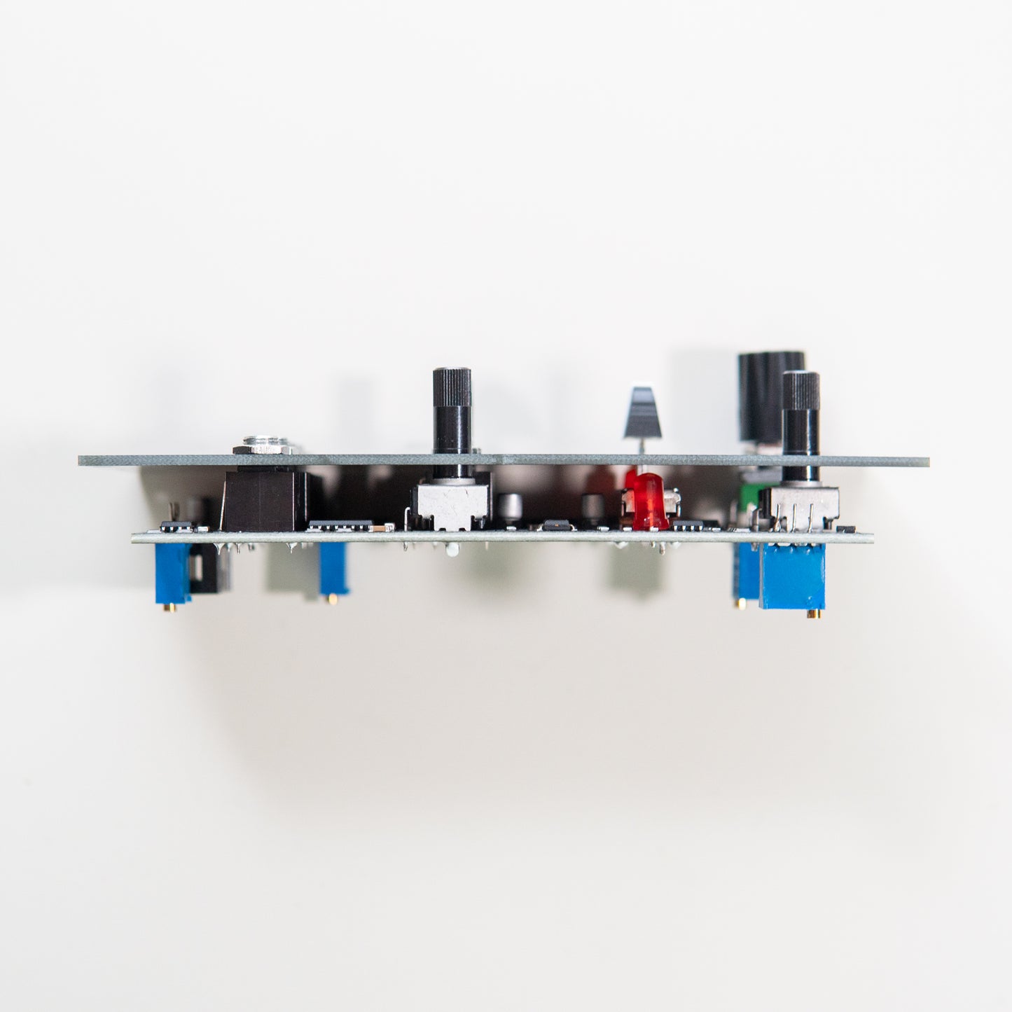 A side profile shot of the Riot ST VCF Eurorack module, illustrating its shallow depth. The slim design indicates it is "skiff friendly," meaning it will fit in compact Eurorack cases.